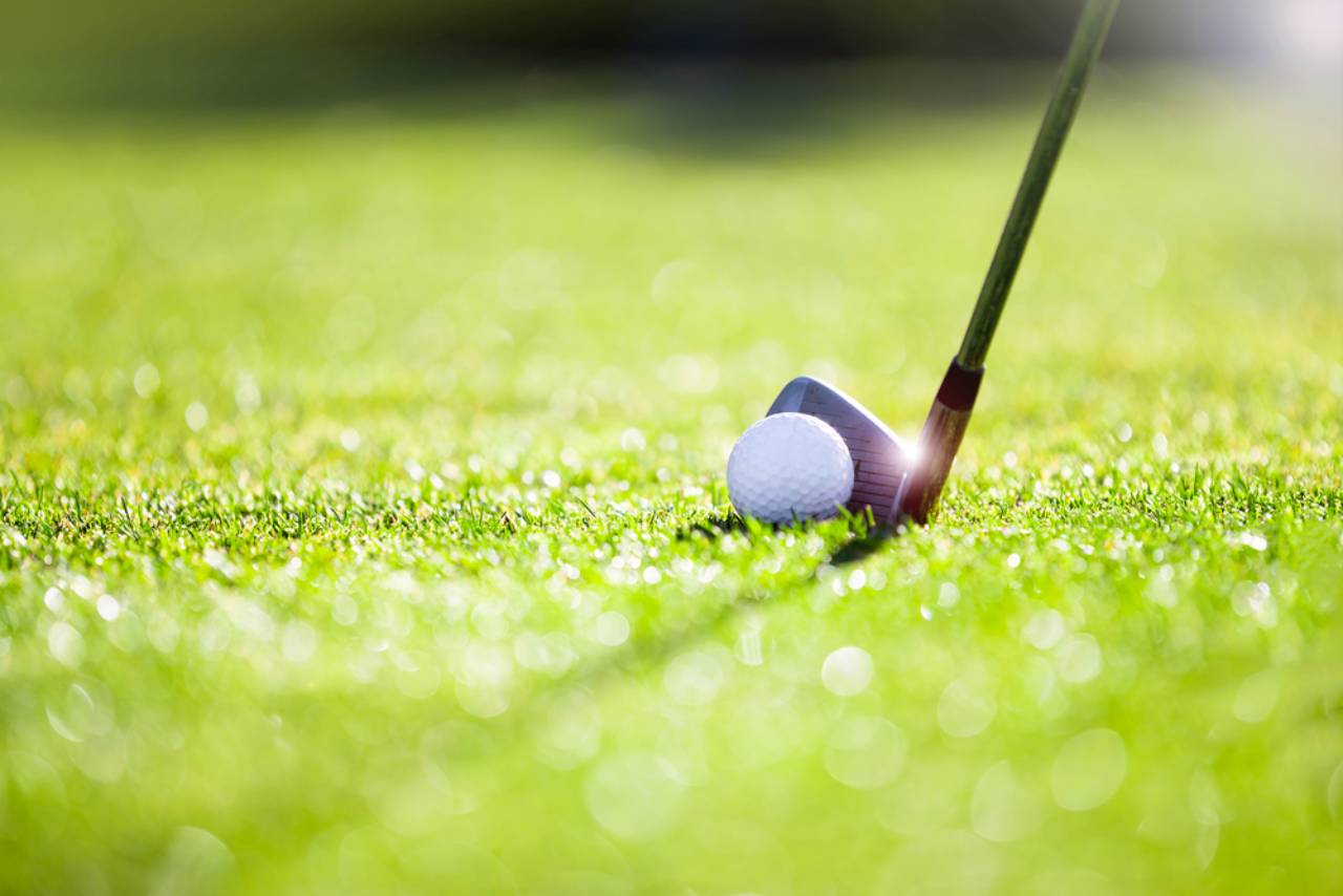How to Hit Down on The Golf Ball (7 Tips + 3 Drills) • Honest Golfers