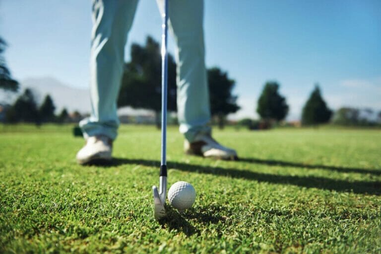 How to Hit Down on The Golf Ball (7 Tips + 3 Drills) • Honest Golfers