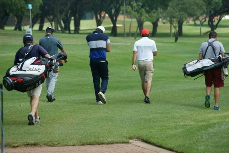 What is a Golf Caddy? [2026 Golf Caddie Guide] • Honest Golfers